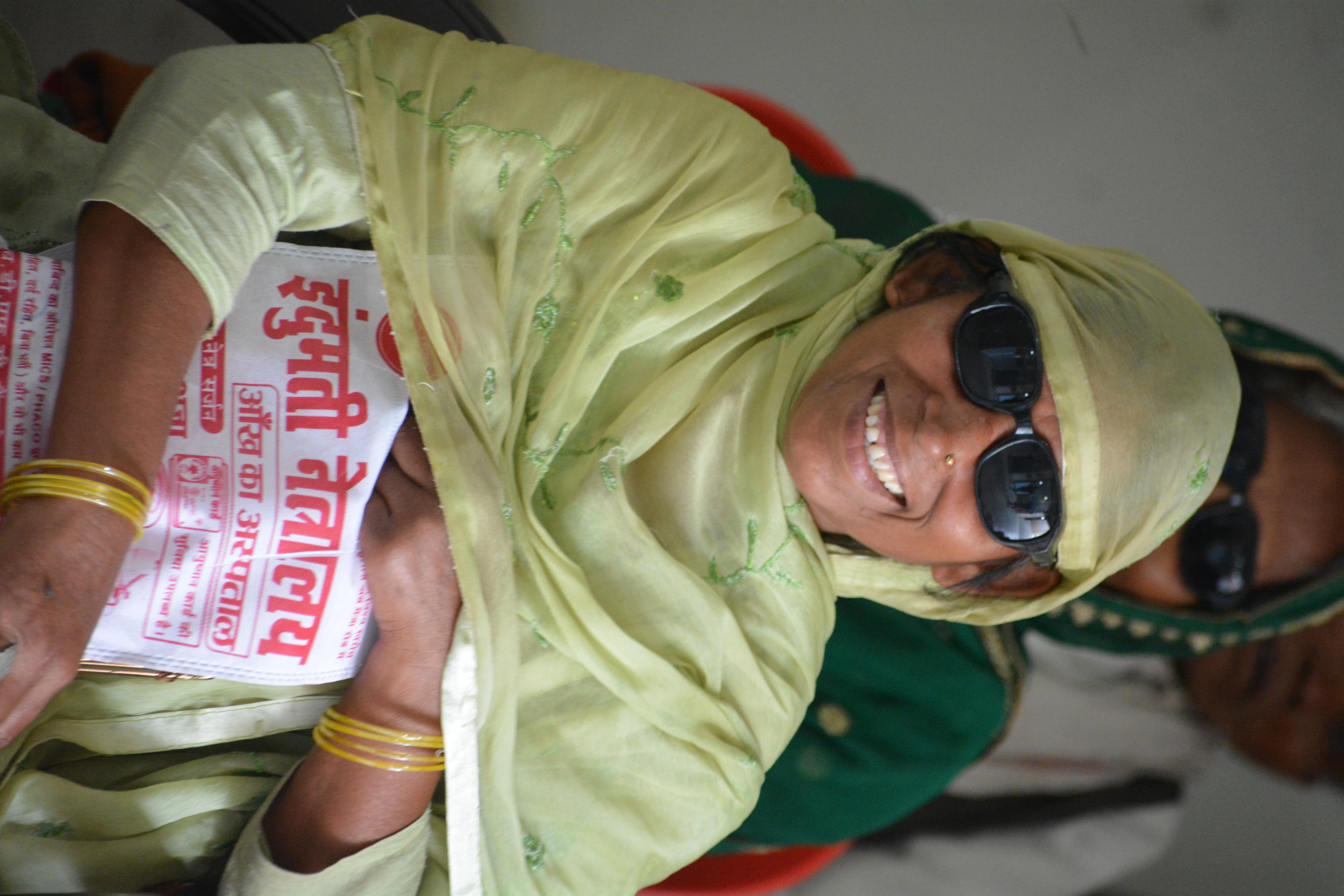 Patient smiling joyfully after successful free cataract surgery at Indumati Netralaya, Prayagraj