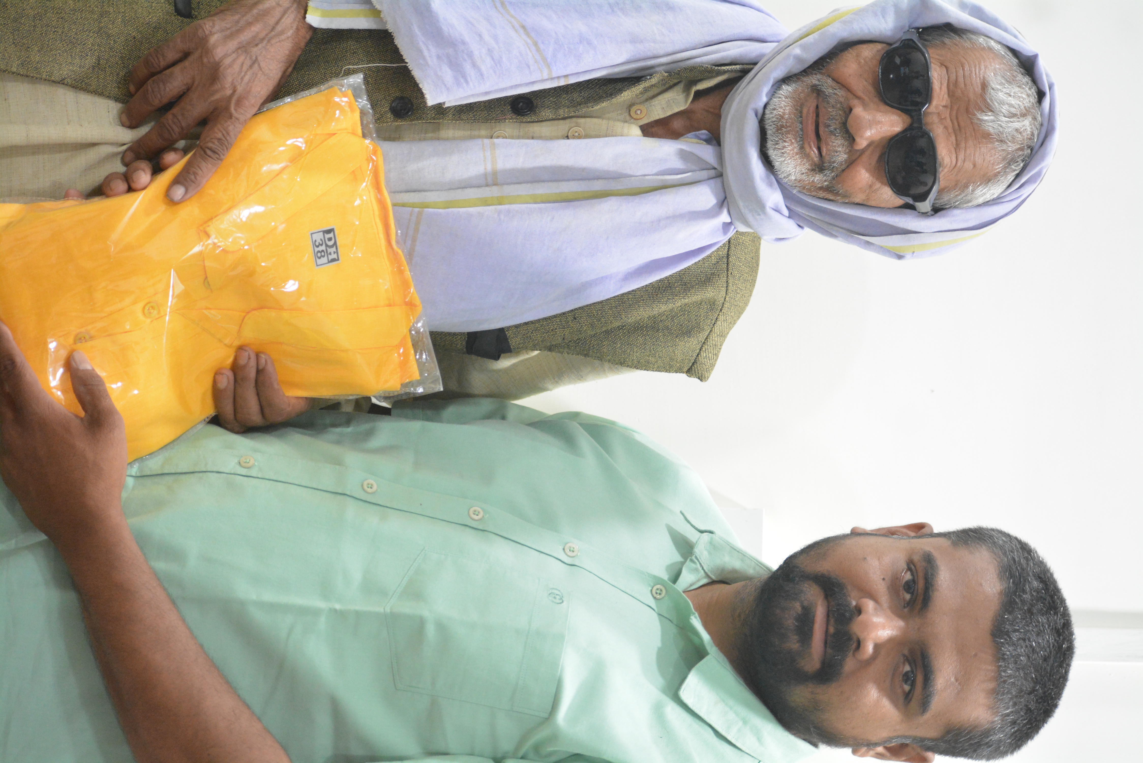 Patient receiving post-surgery medicine kit at Indumati Netralaya after free cataract operation
