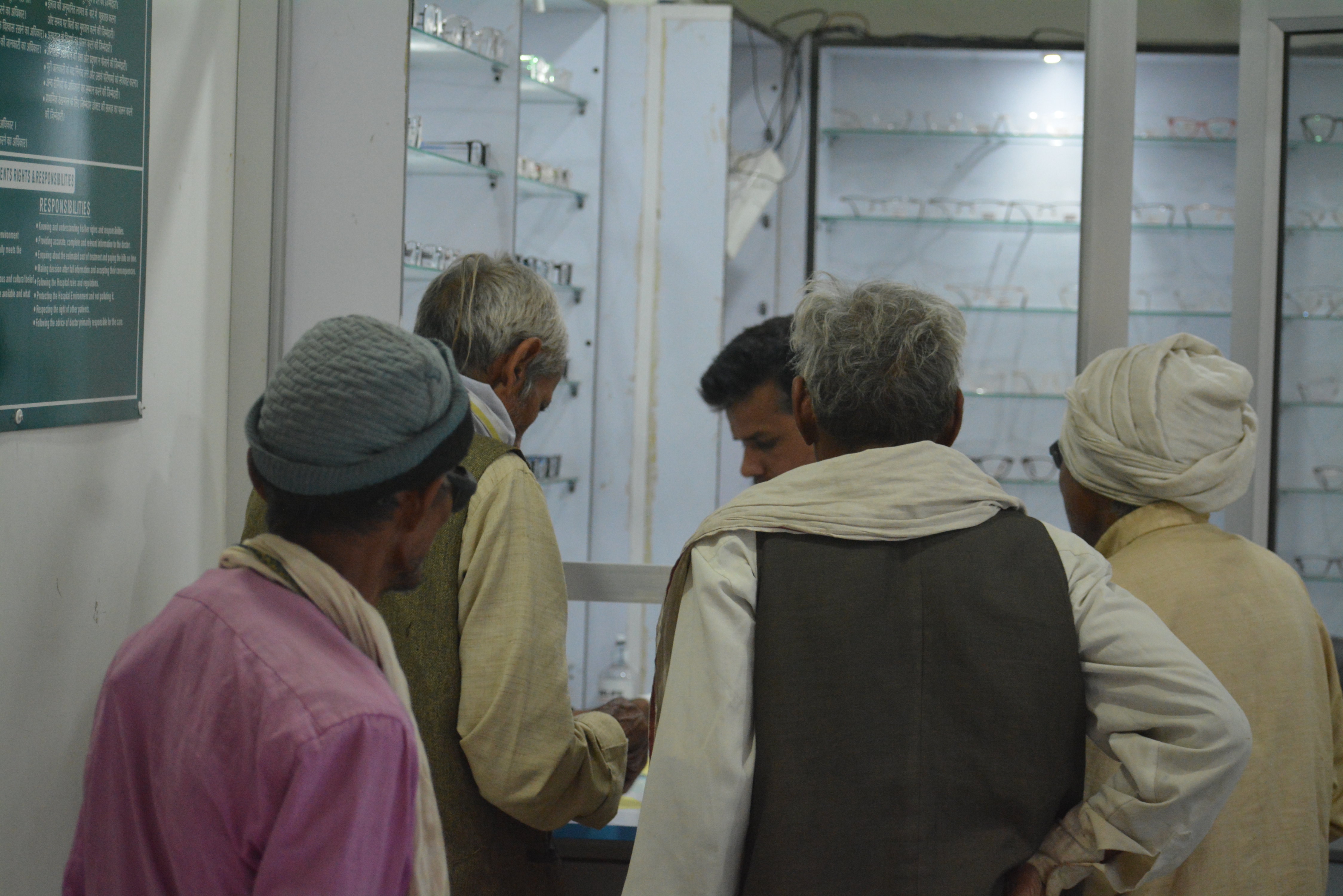 Patients receiving spectacles at Indumati Netralaya optical store, Meja Road, Prayagraj